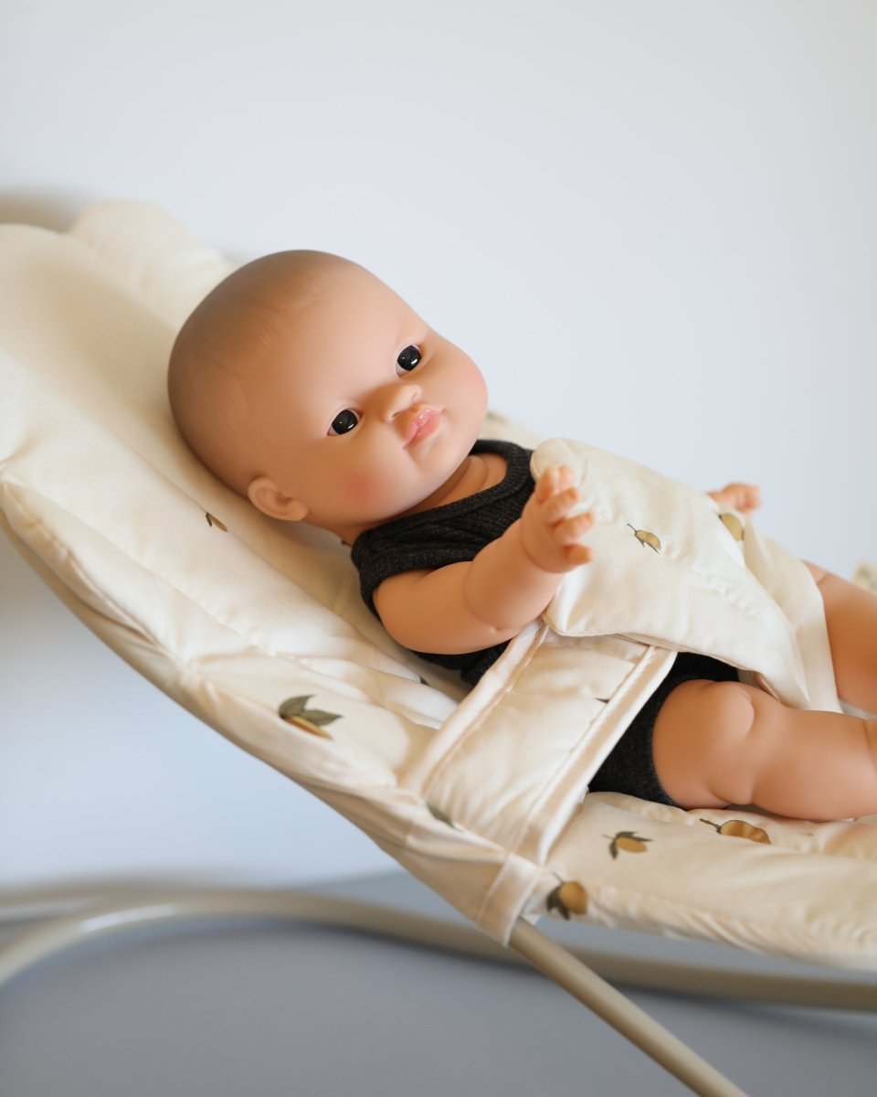 Doll furniture with realistic baby bouncer promoting developmental pretend play