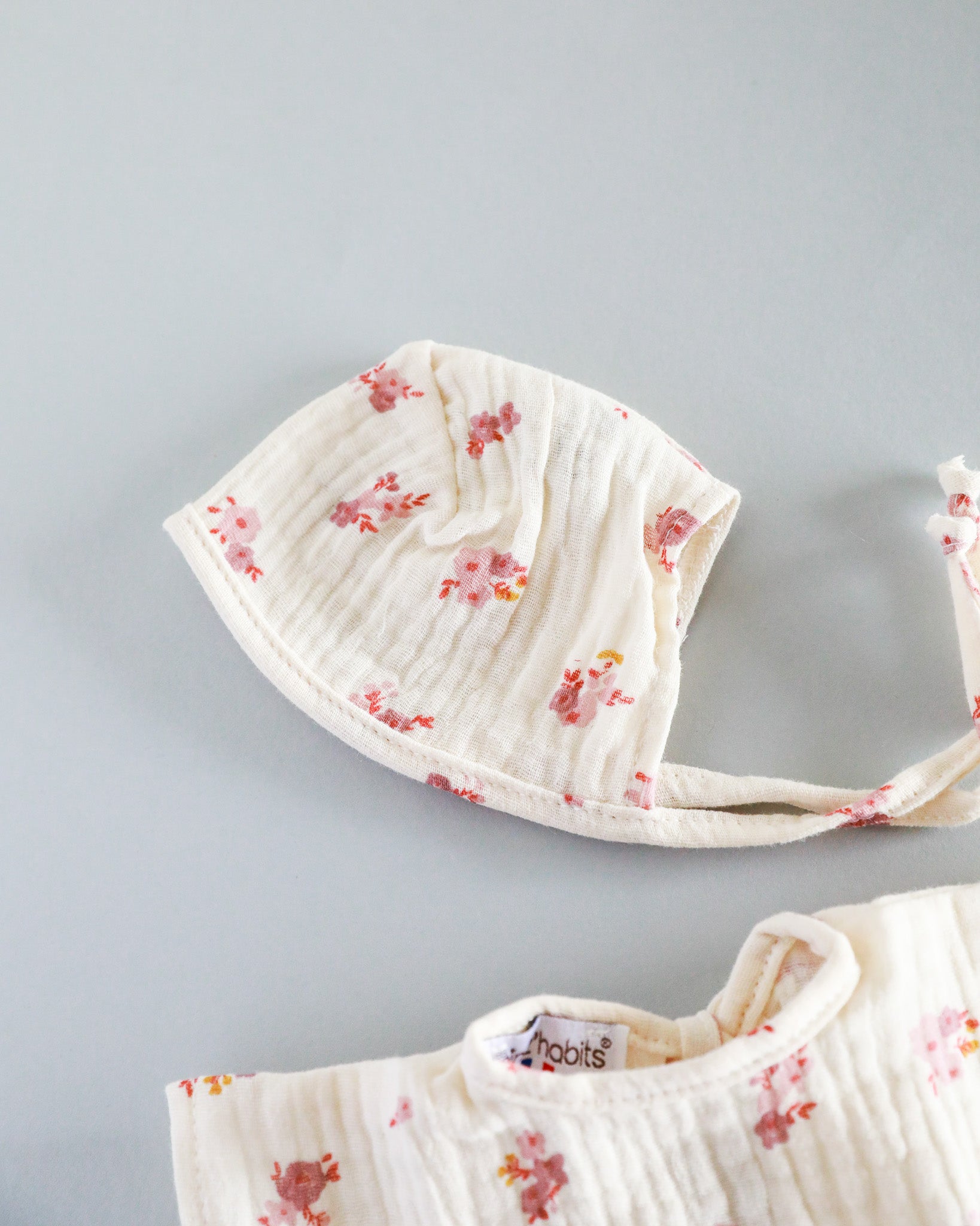 Minikane Doll Clothes | Soft Body Doll Romper with Bonnet - Flowers