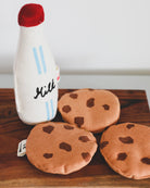 Complete play food snack set featuring three chocolate chip cookies and branded milk bottle with red cap