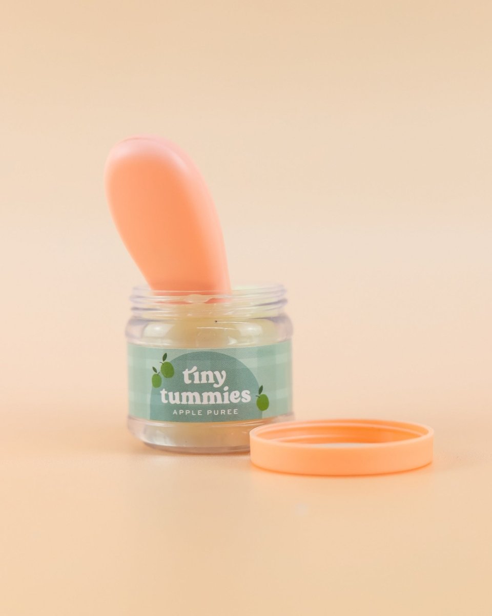 Detailed play kitchen food set with Tiny Harlow apple puree and feeding spoon