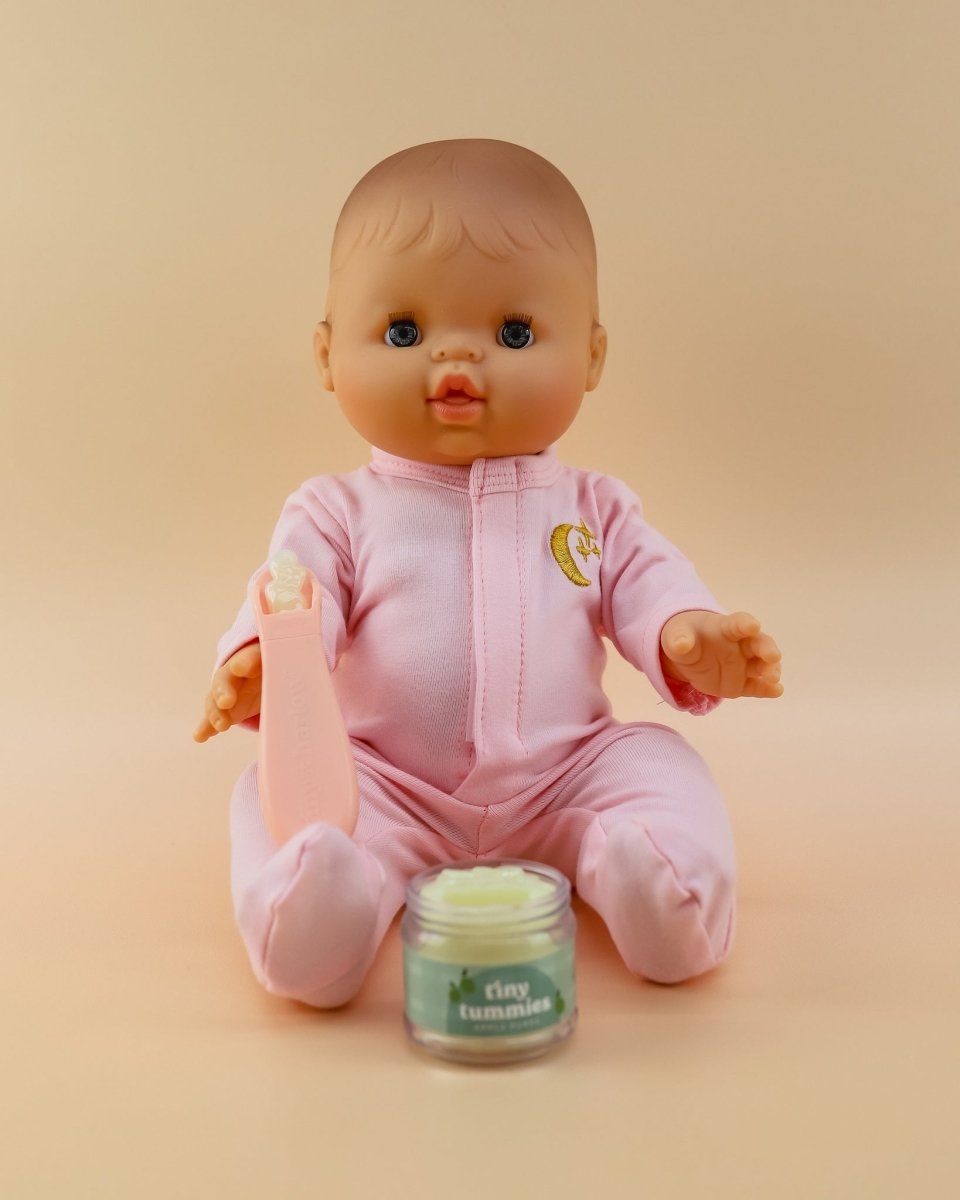 Miniature play kitchen accessories featuring Tiny Harlow apple puree doll food collection