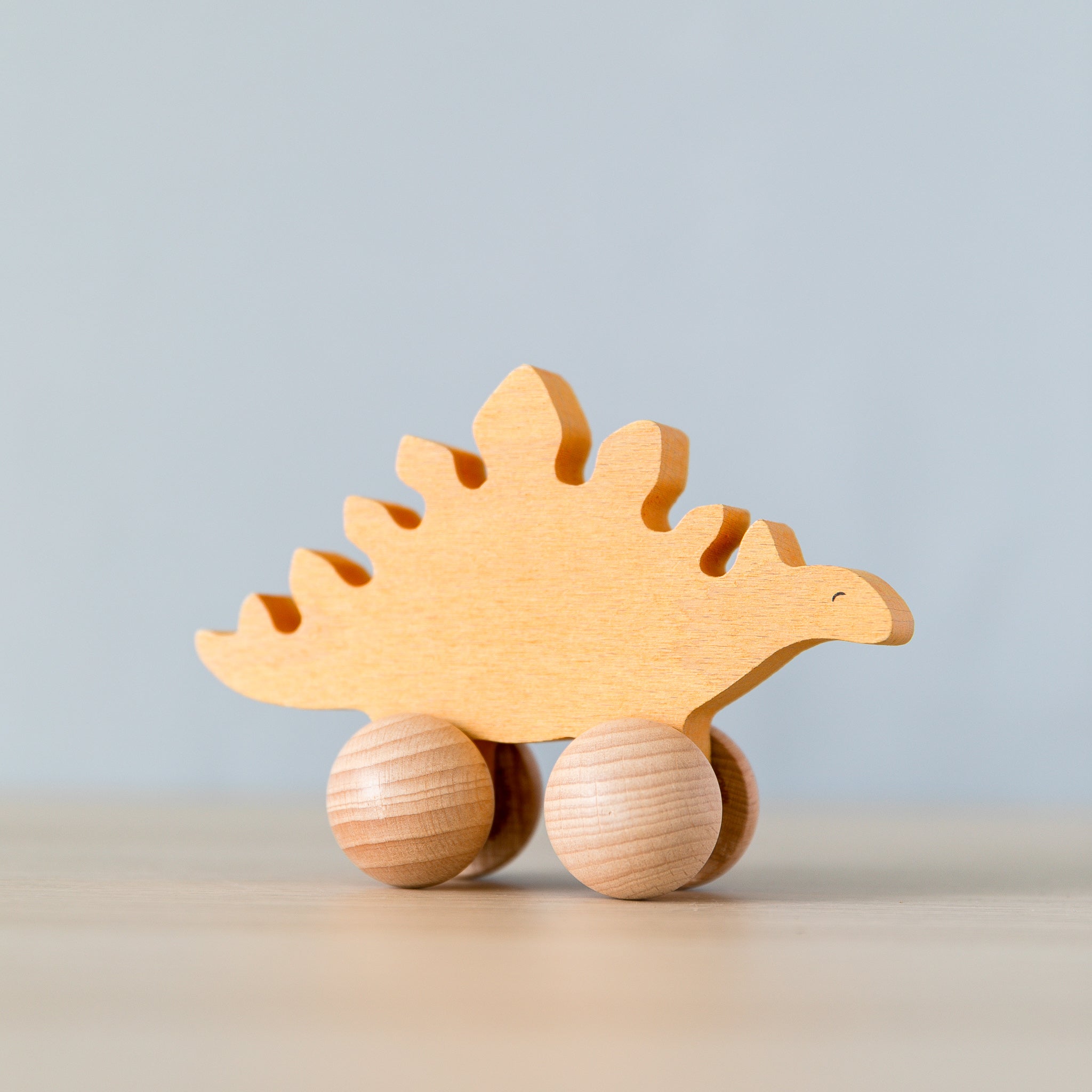 Wooden Rolling Dinosaur - Stegosaurus