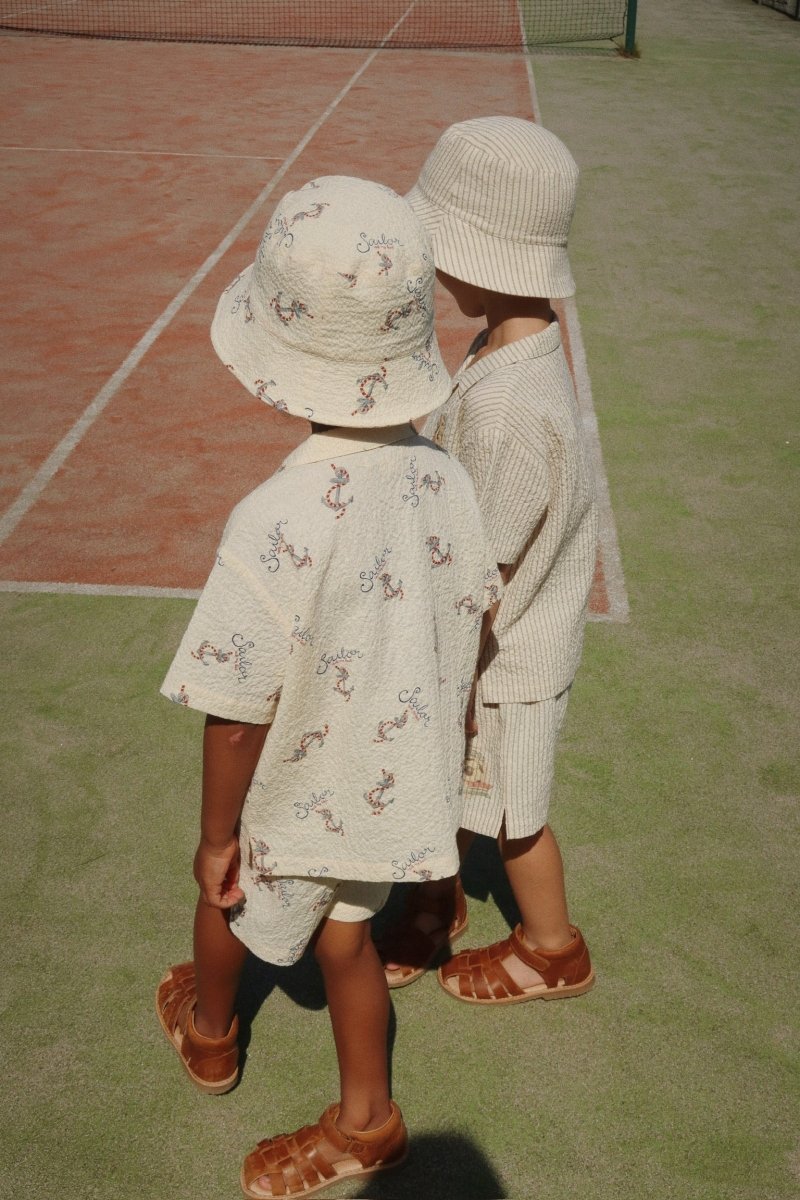 2 Boys Wearing a Bucket Hat