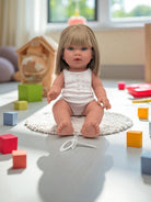 Adelaide doll's expressive face and lifelike features for pretend play