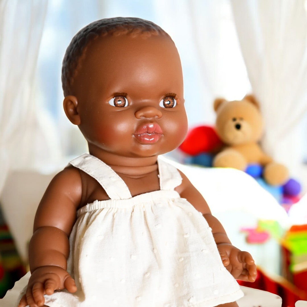 African Baby Girl Light Eyes Playroom