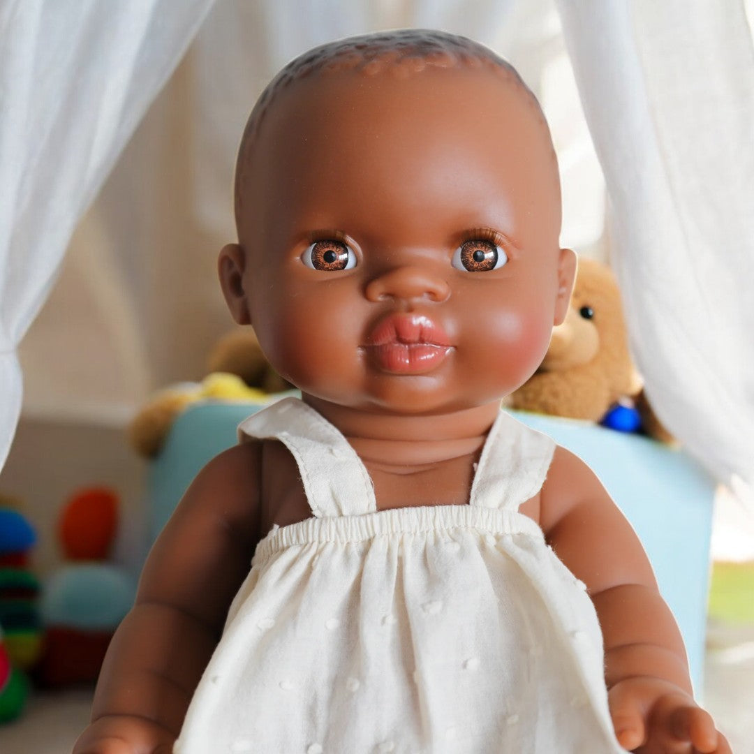 African Baby Girl Light Eyes Playroom