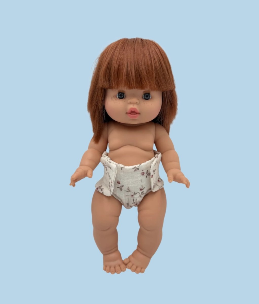 Spring-inspired doll wardrobe pieces with floral patterns