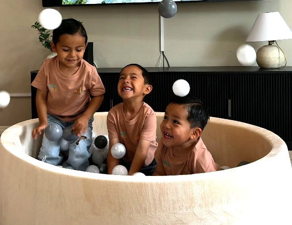 children playing in ball pit