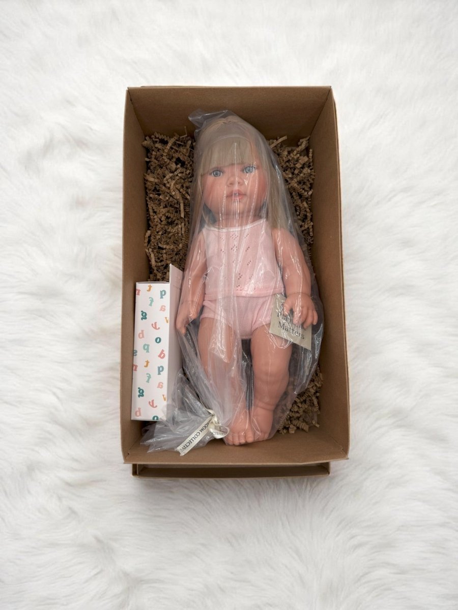 European-designed Adelaide doll in elegant pink outfit for nurturing scenarios