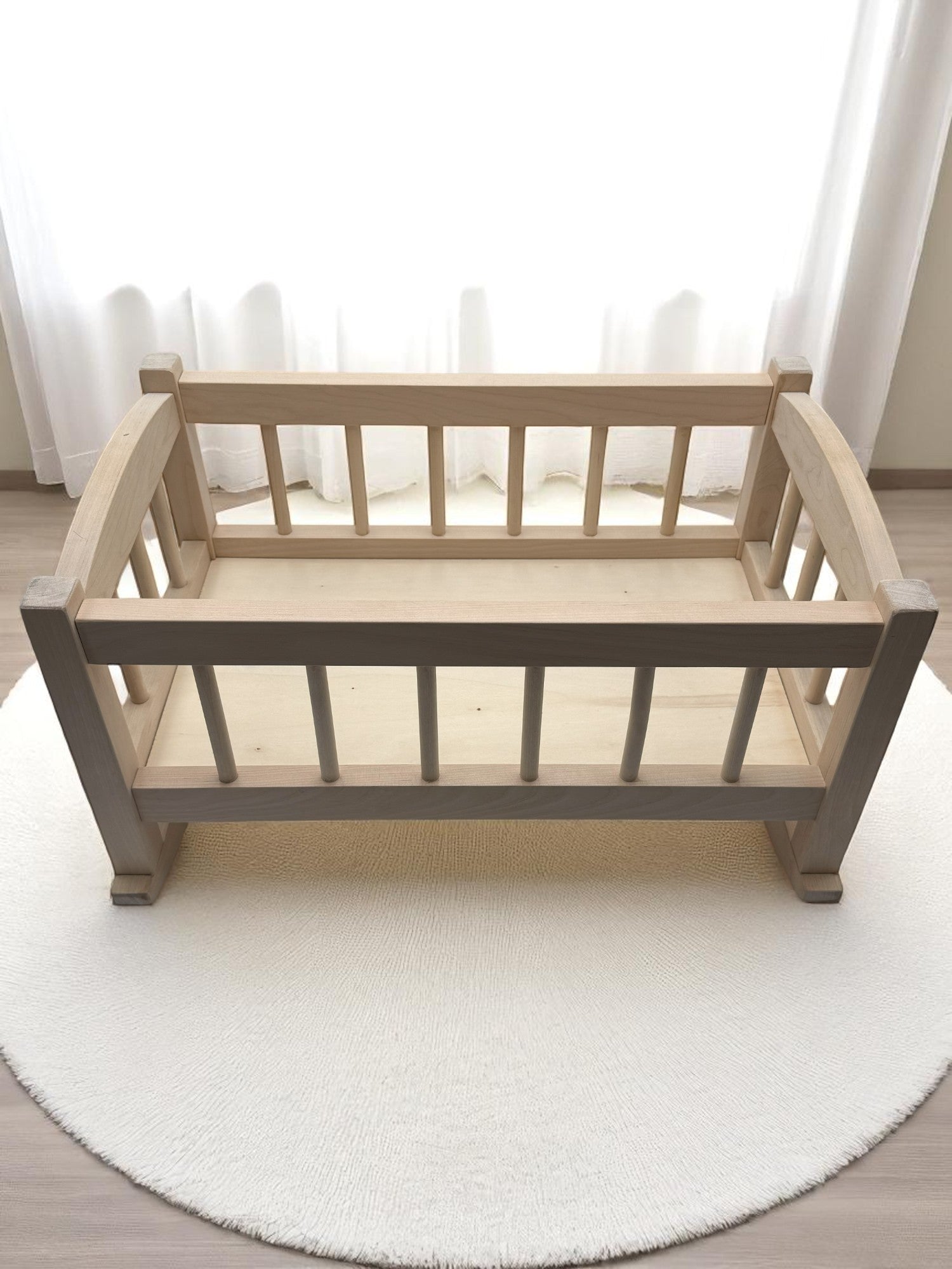 Baby doll cradle with natural birch construction perfect for children's playroom developmental activities