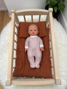 Natural wooden baby doll bed Bebenita cradle perfect for screen-free nurturing play experiences