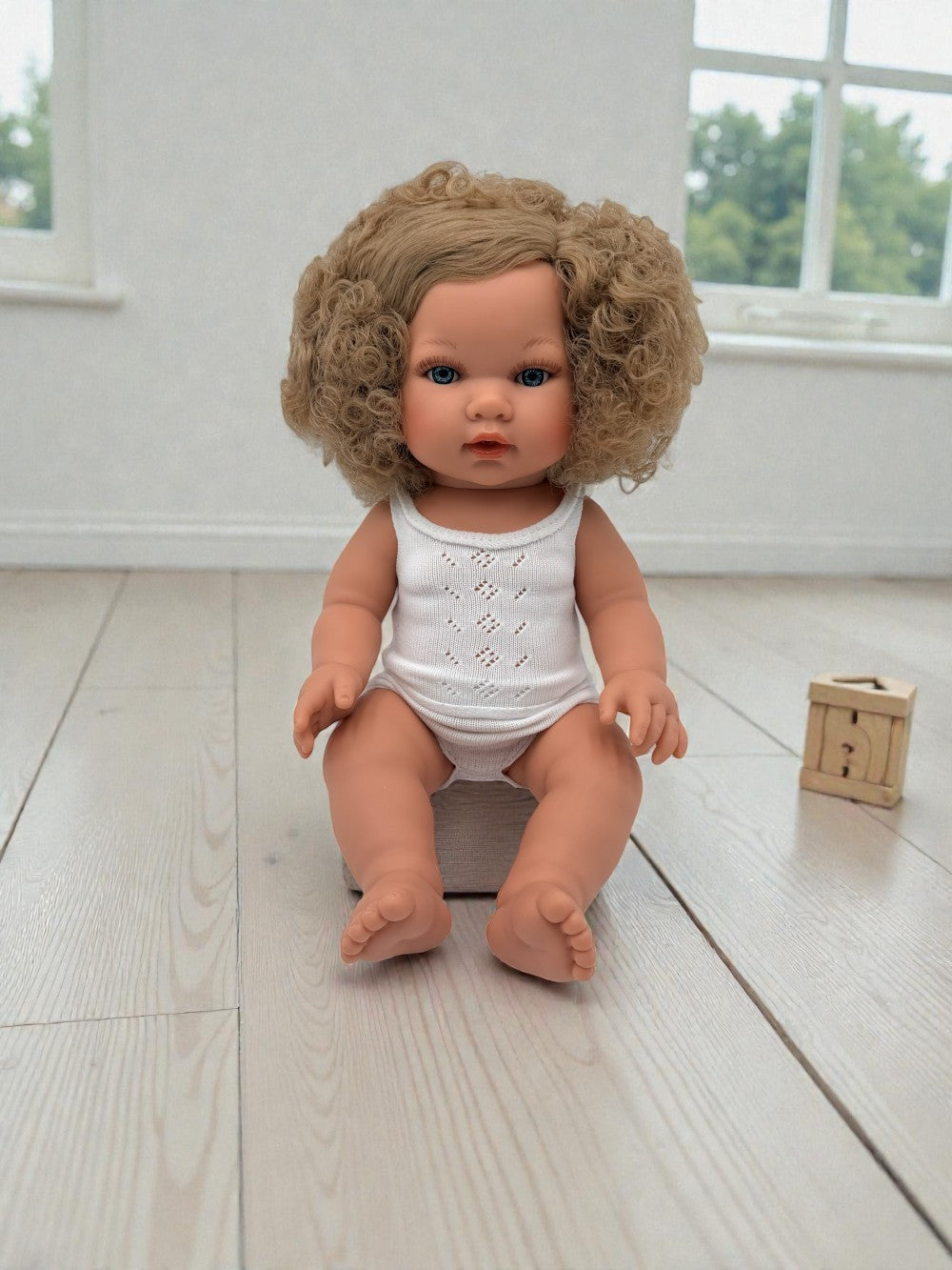 Bebenita Florence 13-inch handmade Spanish baby doll with blonde curly hair blue eyes