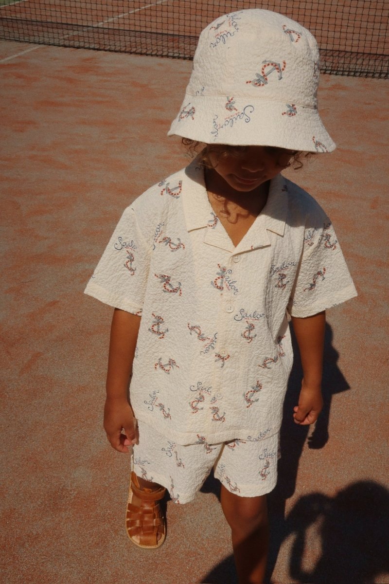 Boy Wearing a Sailor Bucket Hat