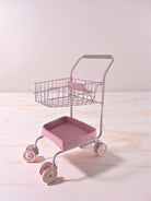 Professional-grade front wheels on shopping cart showing smooth-rolling capability for easy navigation