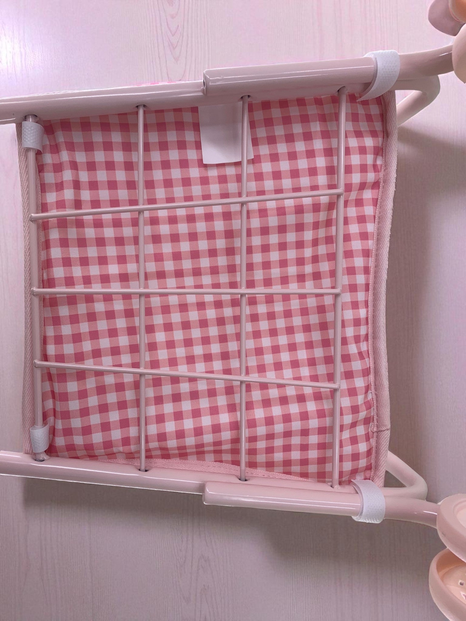 Close-up of Bubblegum Gingham pattern showing classic pink and white checkered design on premium peach skin polyester