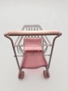 Comfortable EVA foam handle on pink gingham shopping cart designed for small hands during pretend play adventures