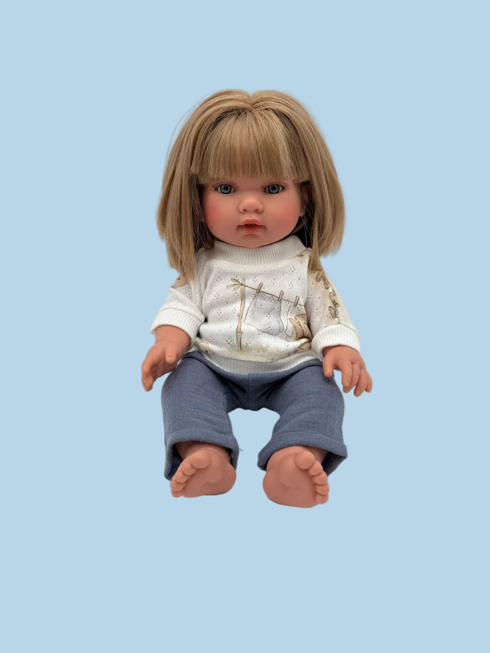 Bebenita doll wearing original bunny print sweater and coordinating grey pants, handmade in Poland