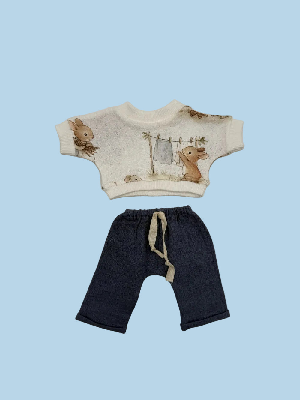 Two-piece bunny print doll outfit handcrafted in Poland from OEKO-TEX certified cotton, fits 11–14 inch dolls