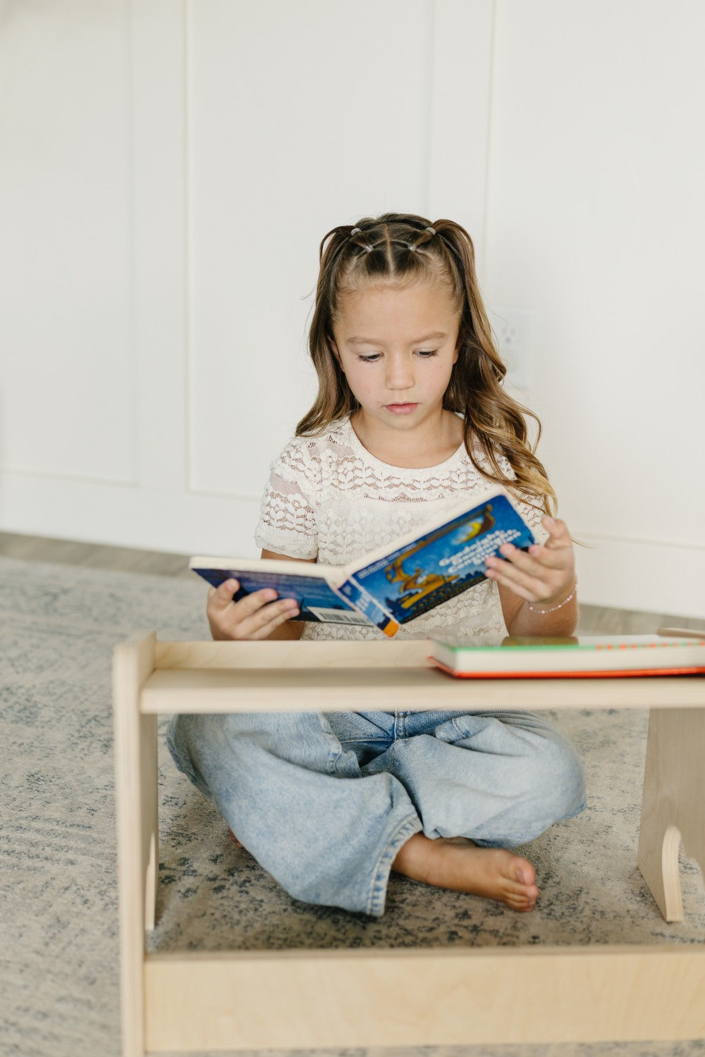 Child Reading at Lap Desk