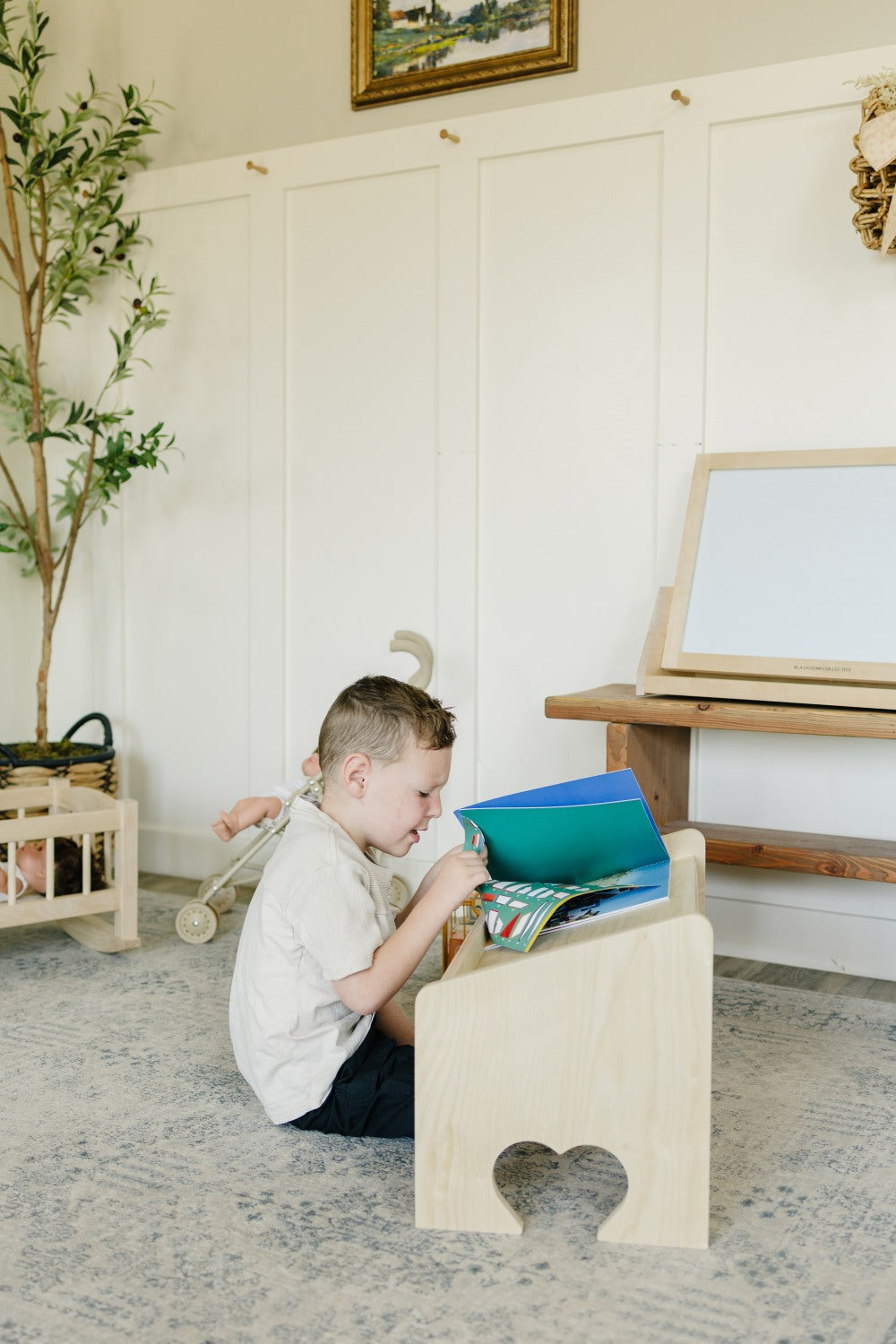 Child Reading on Lap Desk Side View