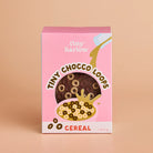 Box of Tiny Choco Loops cereal with pink background