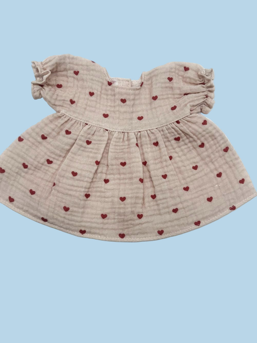 Vintage-inspired doll dress in Dreamy Mauve Hearts print with ruffled short sleeves