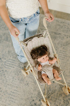 Doll in Doll Stroller
