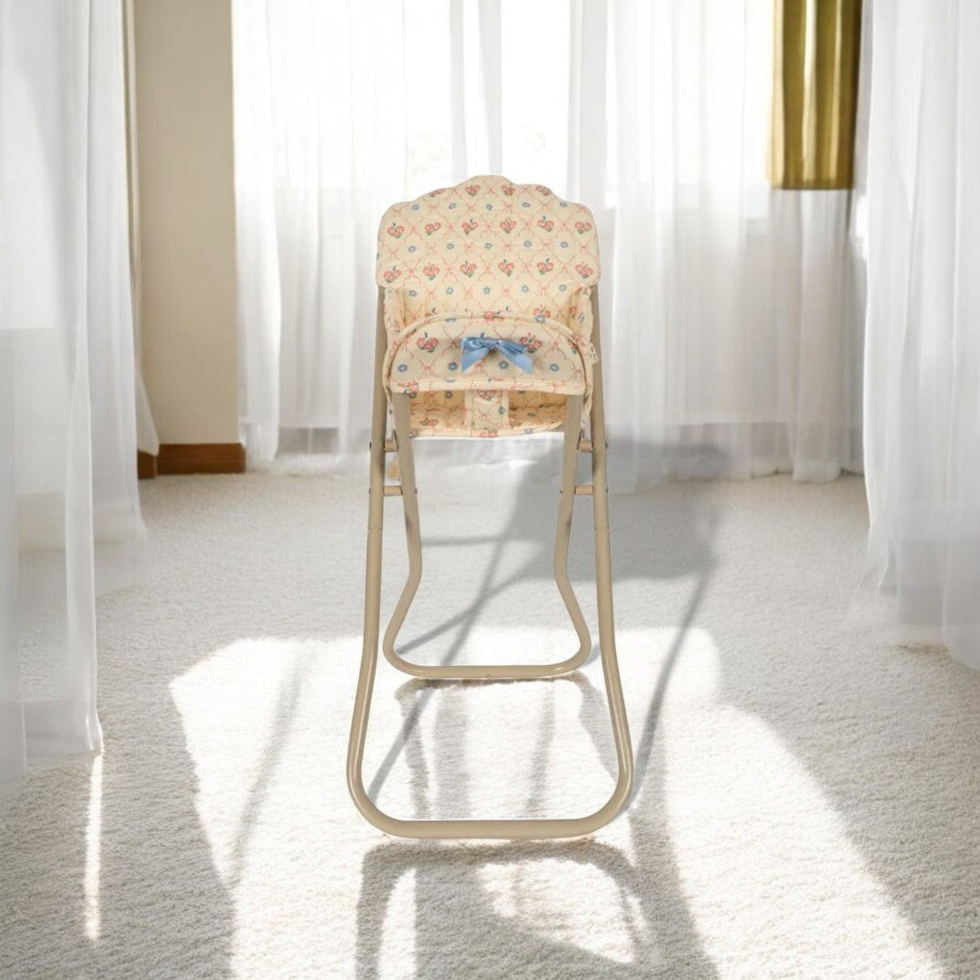 Playroom-ready baby doll high chair encouraging nurturing behaviors