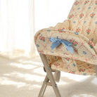 Playroom-perfect baby doll high chair with detailed construction elements