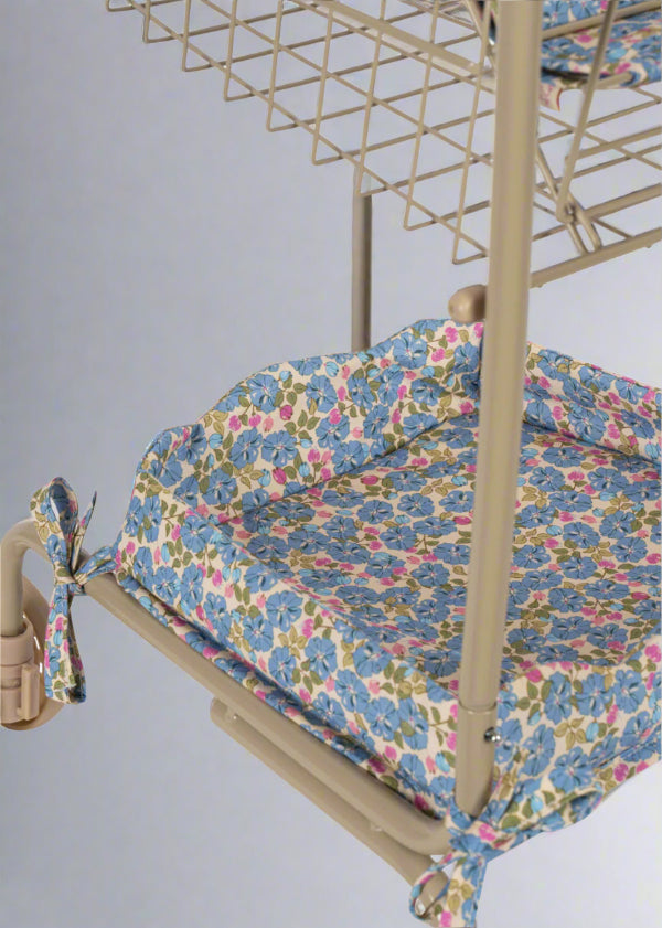 Premium recycled cotton blend fabric in Fleur Rosier print showing sustainable textile quality and botanical design artistry