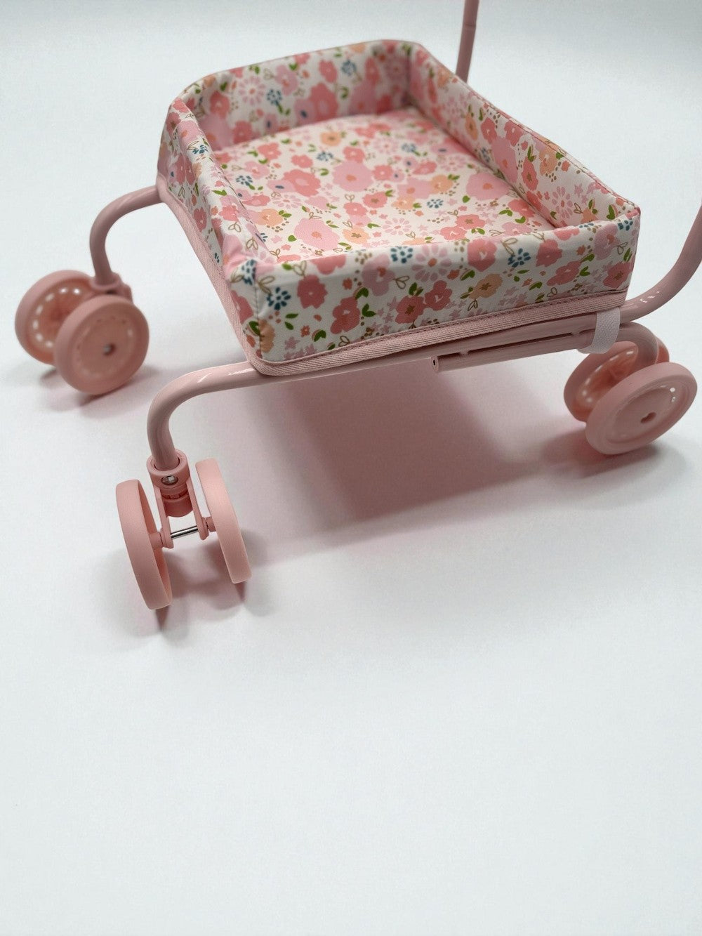 Professional-grade front wheels on shopping cart showing smooth-rolling capability for easy navigation