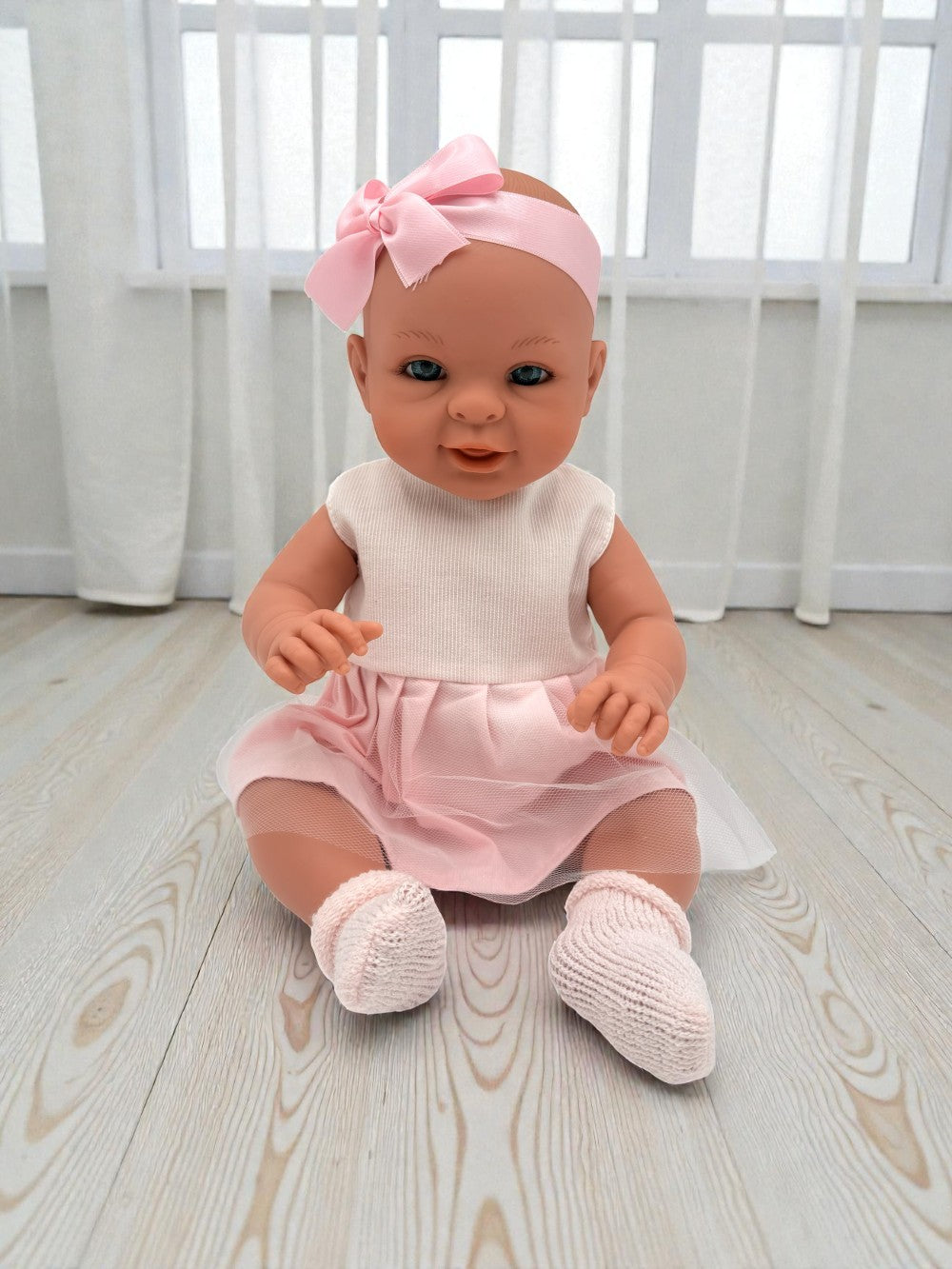 Handcrafted 18-inch Bebenita baby girl doll with hand-painted eyes in sweet pink dress