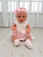 Handcrafted 18-inch Bebenita baby girl doll with hand-painted eyes in sweet pink dress