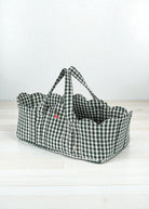 Green check doll bassinet with classic gingham pattern, sturdy handles and soft cotton interior lining