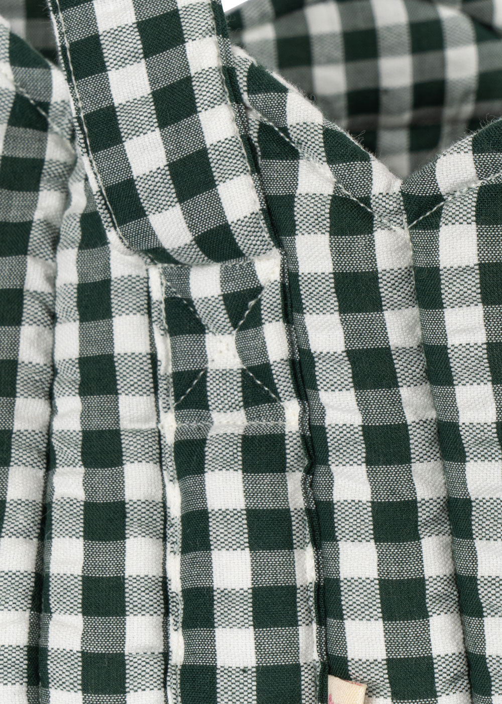 Premium green and white check cotton construction showing durable weave and classic gingham pattern