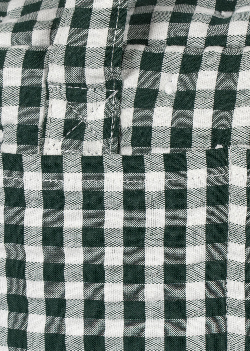 Close-up of embroidered cherry design on green gingham children's doll diaper bag