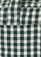 Close-up of embroidered cherry design on green gingham children's doll diaper bag