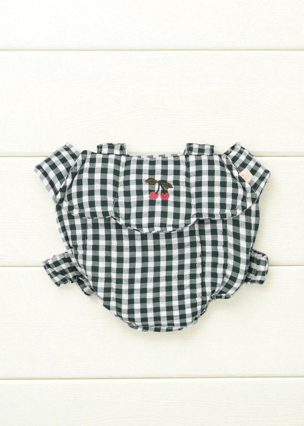 Green Check doll carrier with classic gingham pattern and comfortable scrunch straps for hands-free doll carrying