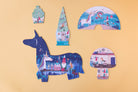 Unicorn-shaped puzzle with colorful design on a beige background