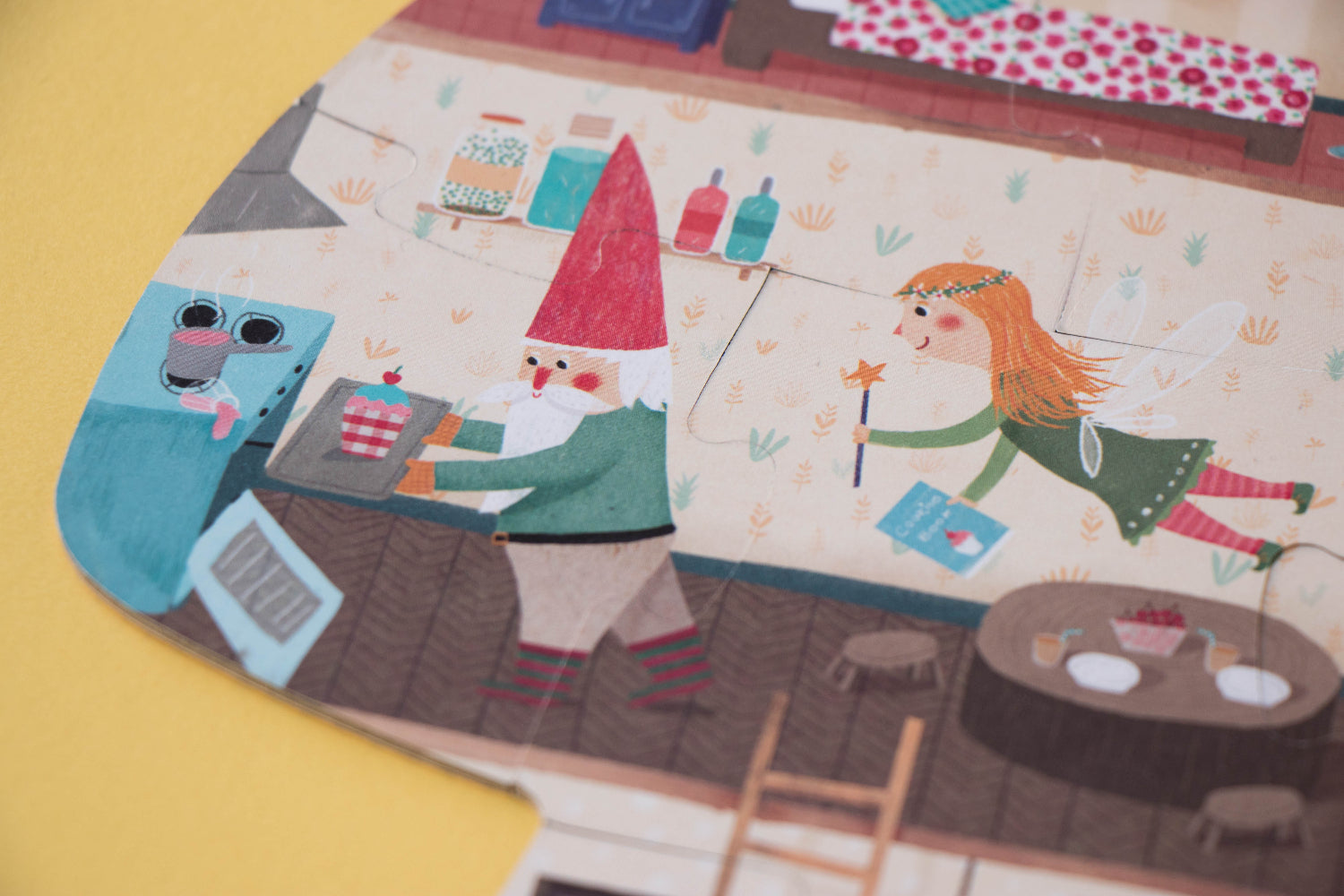 Children's illustration on a puzzle cover with colorful characters and objects.
