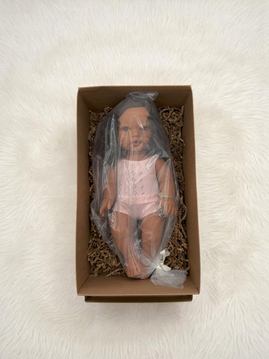 Real life baby doll Havana with gorgeous curly brunette locks for meaningful developmental play