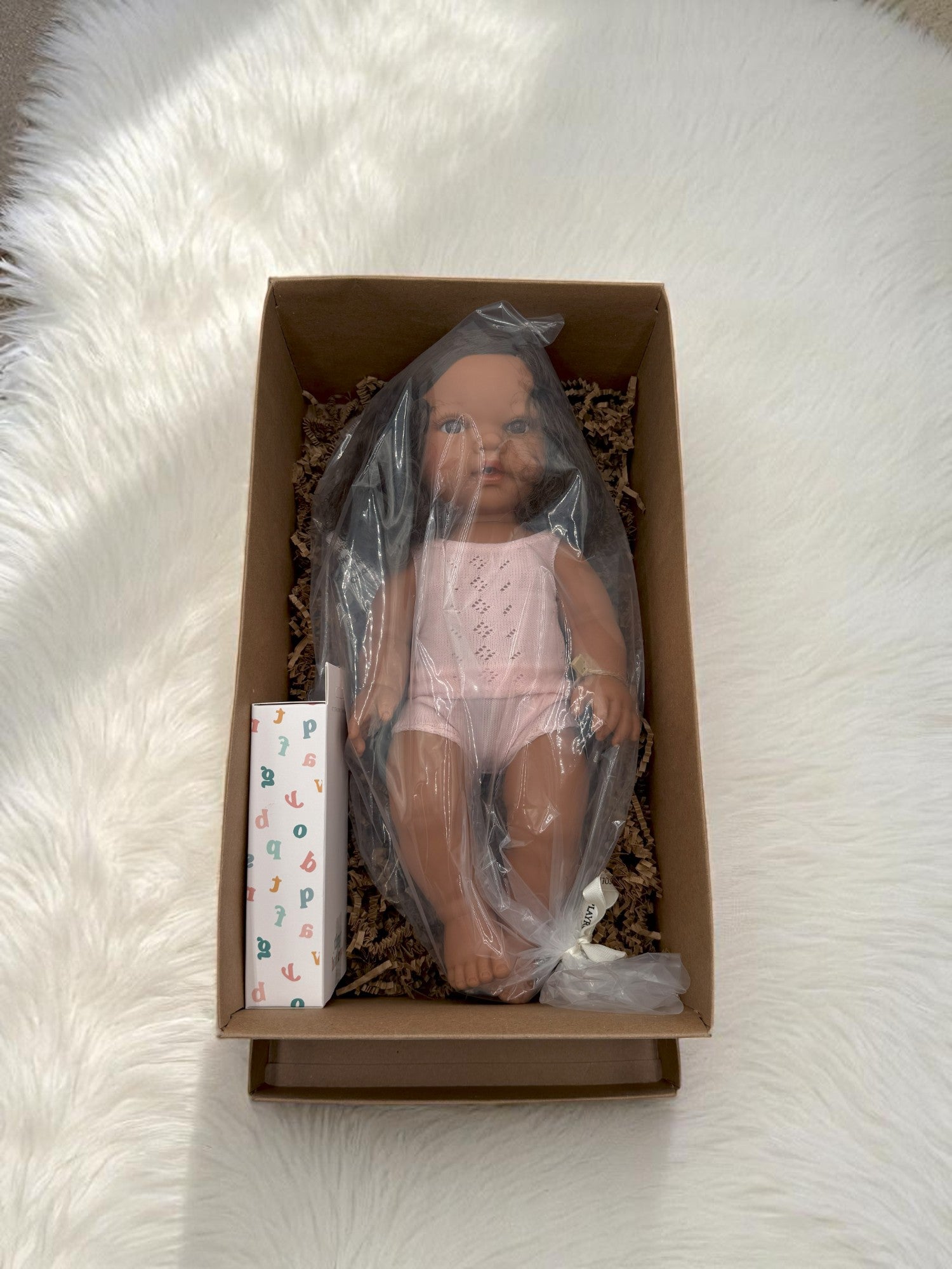 Savannah multicultural baby doll with realistic features ideal for children's playroom representation activities