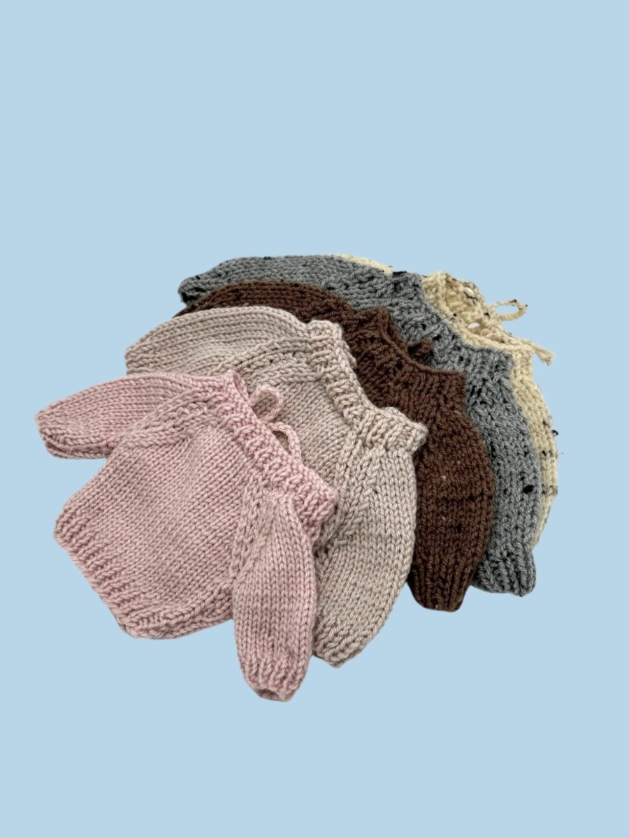 Baby doll clothes with decorative topstitching