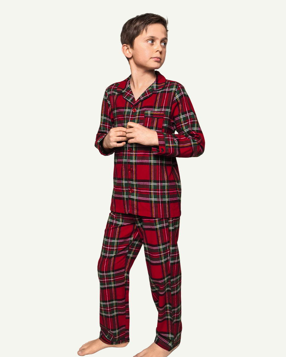 Traditional red tartan pattern detail showing brushed flannel texture on Petite Plume holiday pajamas