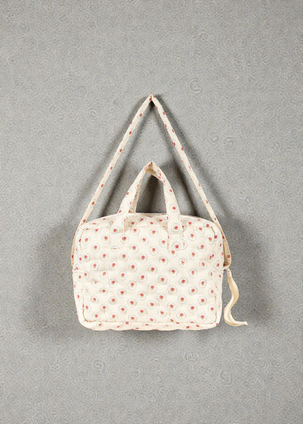OEKO-TEX cotton diaper bag showing cream fabric with botanical tulip pattern