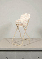 Danish design feeding chair with removable washable fabric for pretend mealtime play