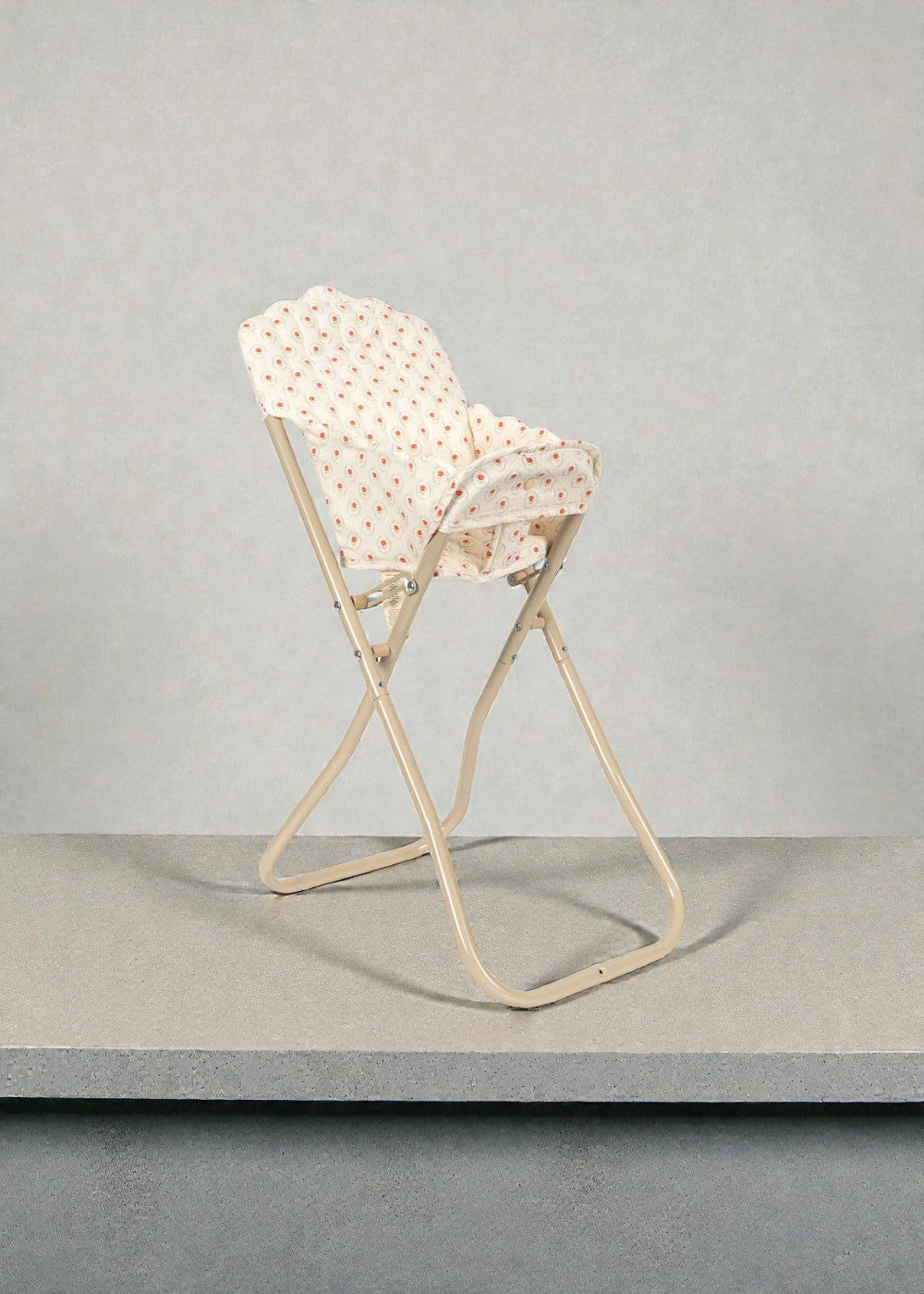 Red tulip pattern doll chair with velcro attachment and sturdy stable frame