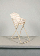 Red tulip pattern doll chair with velcro attachment and sturdy stable frame
