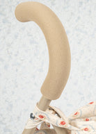 Red tulip pattern doll buggy with velcro fabric attachment and sturdy push frame