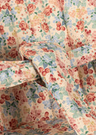 Botanical floral pattern doll buggy with velcro fabric attachment and sturdy push frame